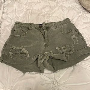 green jean shorts